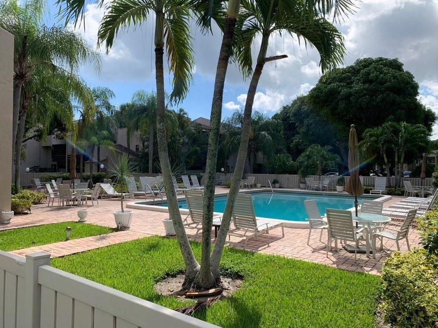 Bright 2 bedroom 2 bathroom corner unit on first floor. Fantastic location in East Boca!! Unit has eat-in kitchen, brand new washer/dryer inside and screened in patio. Brand new luxury vinyl flooring and modern baseboard. Brand new painting and outlets. Brand new AC. Water heater 2021. Plantation shutters in bedrooms. Great community with clubhouse, pool and tennis court. Close to I-95, FAU, Beaches, retaurants and shopping centers. Pet Friendly. Boca A-Rated schools. A lot of parking spaces. Easy to show!!