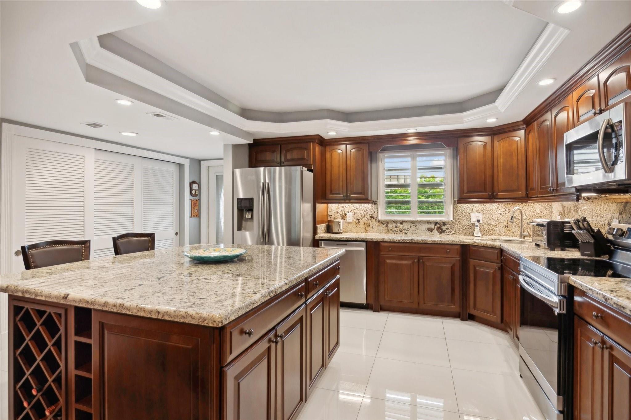 Back on the market!! REDUCED $40,000!! Come see this Luxurious, Majestic, Impeccable and Spacious condo in GUARD GATED Hollybrook. FULLY FURNISHED! Resort type living! Residents golf for FREE on PGA and PAR 3 Golf courses just paying for cart. Take part in tennis, swimming, pickleball, clubs, shows, dancing, movies, fitness center & much more! So much to do! Hollybrook even has a great restaurant on site! In this 1459 sq ft unit enjoy friends around the kitchen island and with cherry and granite cabinets & stainless steel appliances. The full size WASHER & DRYER have their own closet. Closets? The 2 walk-in closets are huge! Relax or entertain on the screened lanai & access from living area or master bedroom. Oh! Bring your pet less than 20 lbs. Please check age and income requirements!