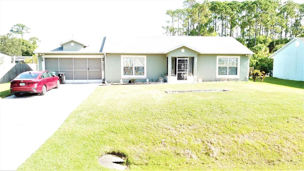 Photo of 8204 Kenwood Road, Fort Pierce, FL 34951 (MLS # R10910474)