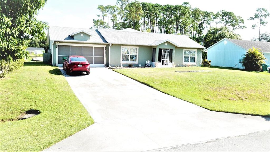 Photo of 8204 Kenwood Road, Fort Pierce, FL 34951 (MLS # R10910474)