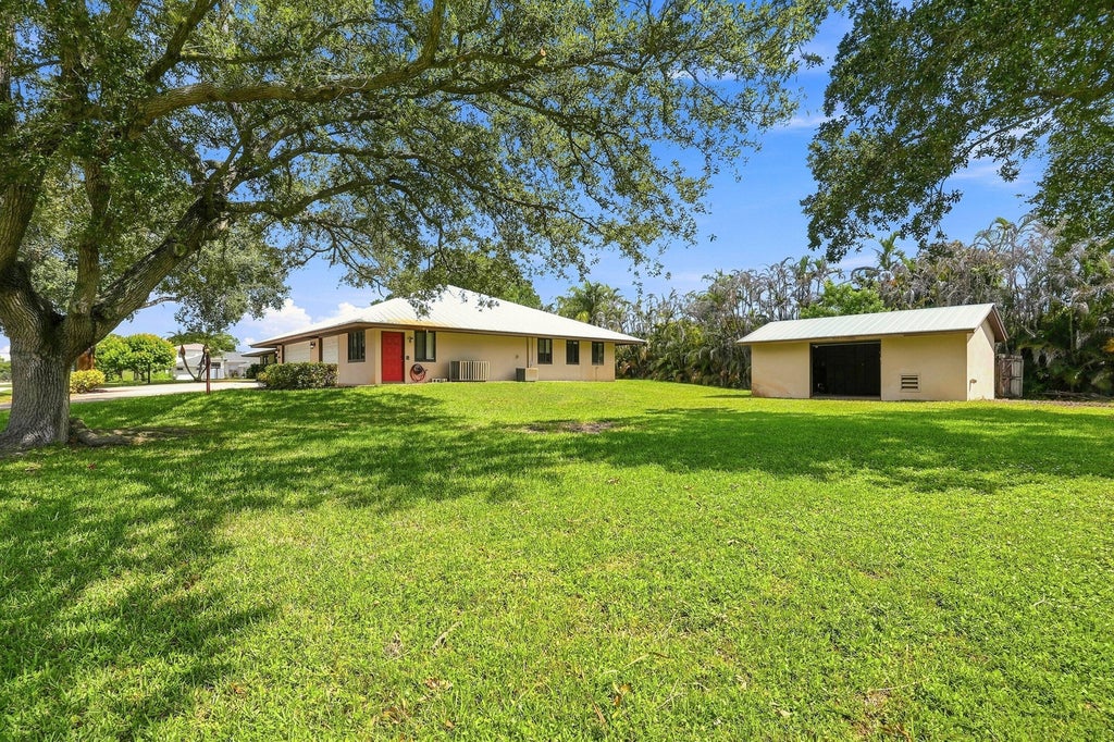 Photo of 2381 SW BAYSHORE Boulevard, Port Saint Lucie, FL 34984 (MLS # B26060825)