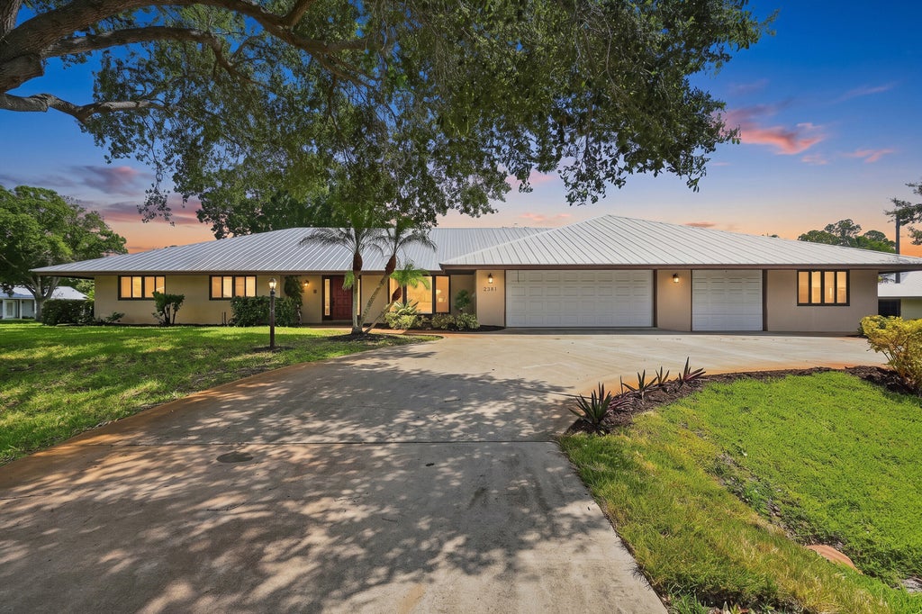 Photo of 2381 SW BAYSHORE Boulevard, Port Saint Lucie, FL 34984 (MLS # B26060825)
