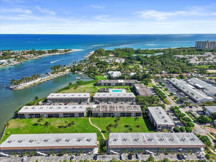 Interior Photos Coming Soon. Location, location, location! Come home to this charming Jupiter Inlet Condominium.The first-floor condo in the heart of Jupiter's waterfront entertainment district provides 2 spacious bedrooms, 2 full bathrooms, washer and dryer in the unit, hurricane impact windows and exterior sliding doors. Ease into your day by enjoying your morning coffee on your glass enclosed in lanai. The property is a short distance from all the Love Street activities, restaurants, shops with close proximity to Jupiter Beach, Dubois Park and a view of the historic Jupiter Lighthouse adding to the allure of JIC. Community amenities include pool, clubhouse, grilling area and 3 waterfront areas for your relaxing pleasure. HVAC and HW 2020Schedule your private tour today!