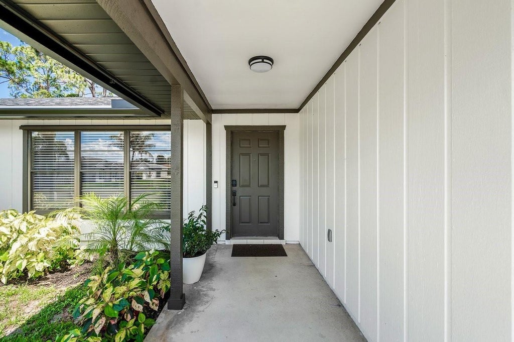 Photo of 247 SE Voltair Terrace, Port Saint Lucie, FL 34983 (MLS # F10442288)
