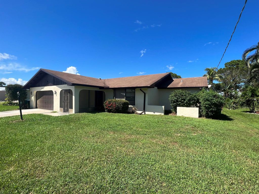 Photo of 1301 SE Palm Beach Road, Port Saint Lucie, FL 34952 (MLS # R11030048)