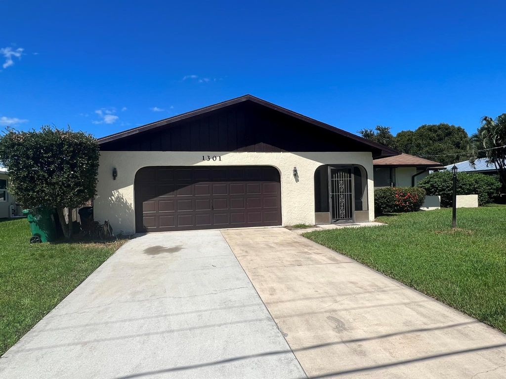 Photo of 1301 SE Palm Beach Road, Port Saint Lucie, FL 34952 (MLS # R11030048)