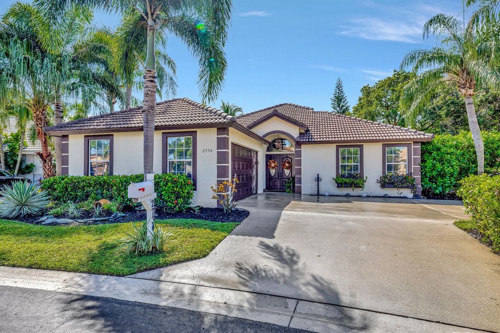 Photo of 2734 Pointe Circle, Greenacres, FL 33413 (MLS # R10922936)