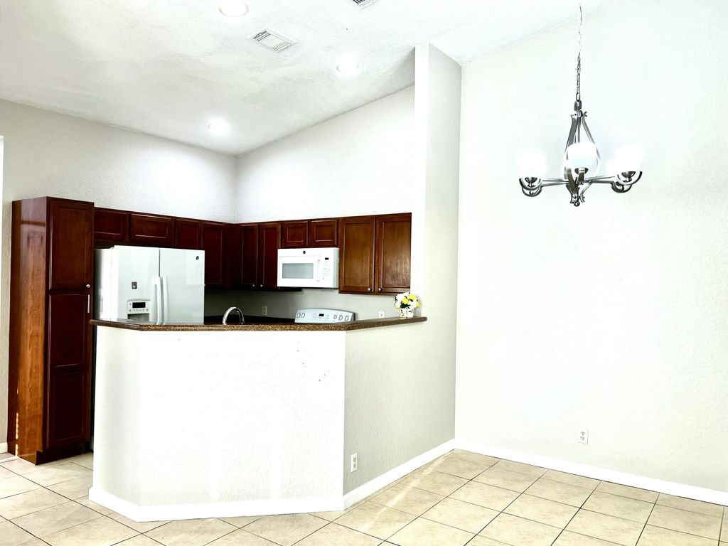 Photo of 2900 Carvelle Drive, Riviera Beach, FL 33404 (MLS # B26007086)