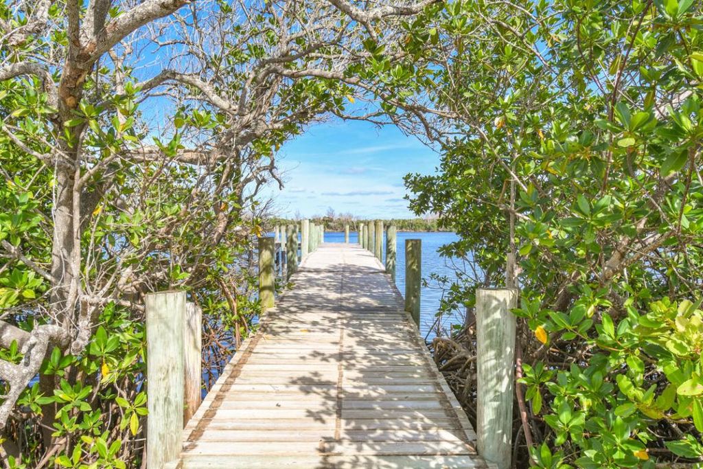 Photo of 5363 SE Miles Grant Road #D203, Stuart, FL 34997 (MLS # R11146139)