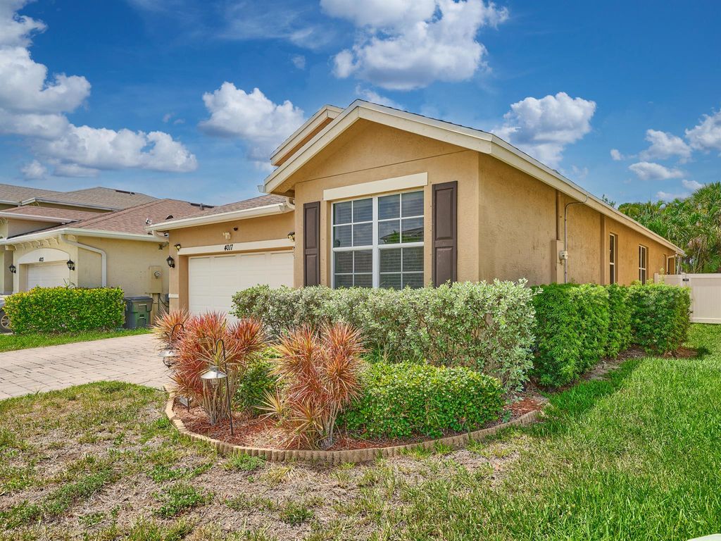 Photo of 4017 Tomoka Drive, Lake Worth, FL 33462 (MLS # R11099801)