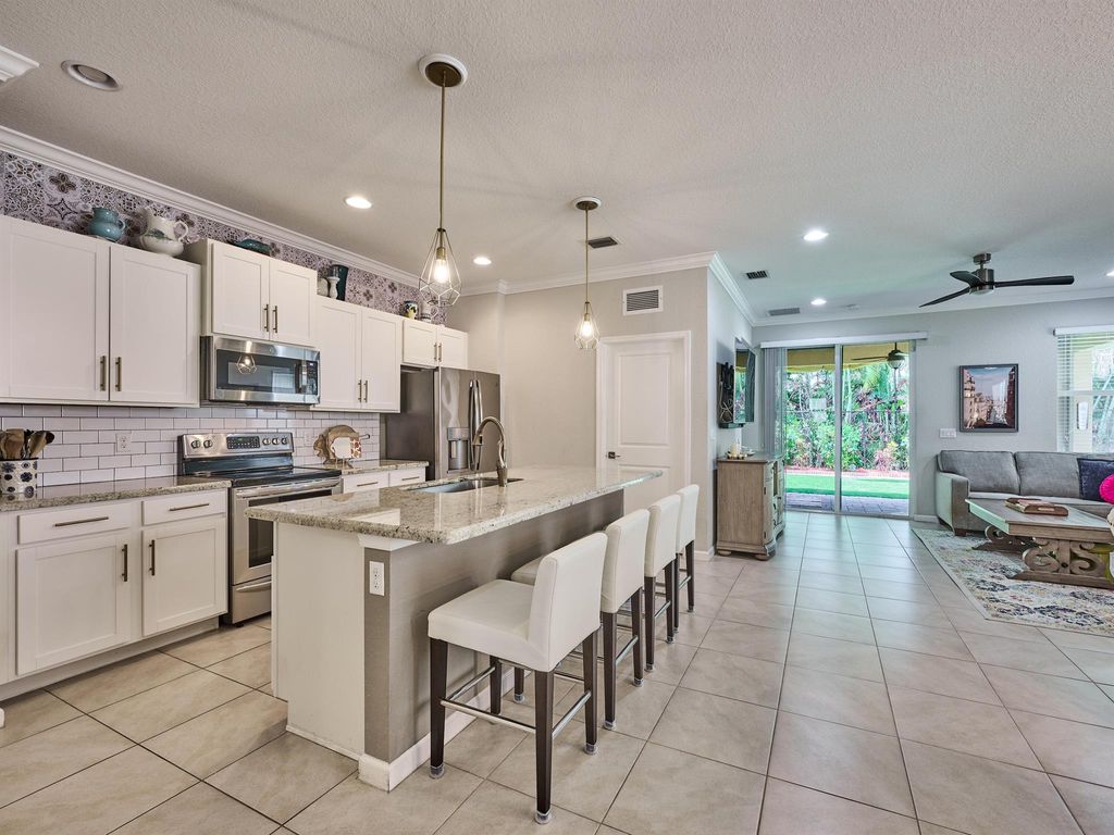 Photo of 4017 Tomoka Drive, Lake Worth, FL 33462 (MLS # R11099801)