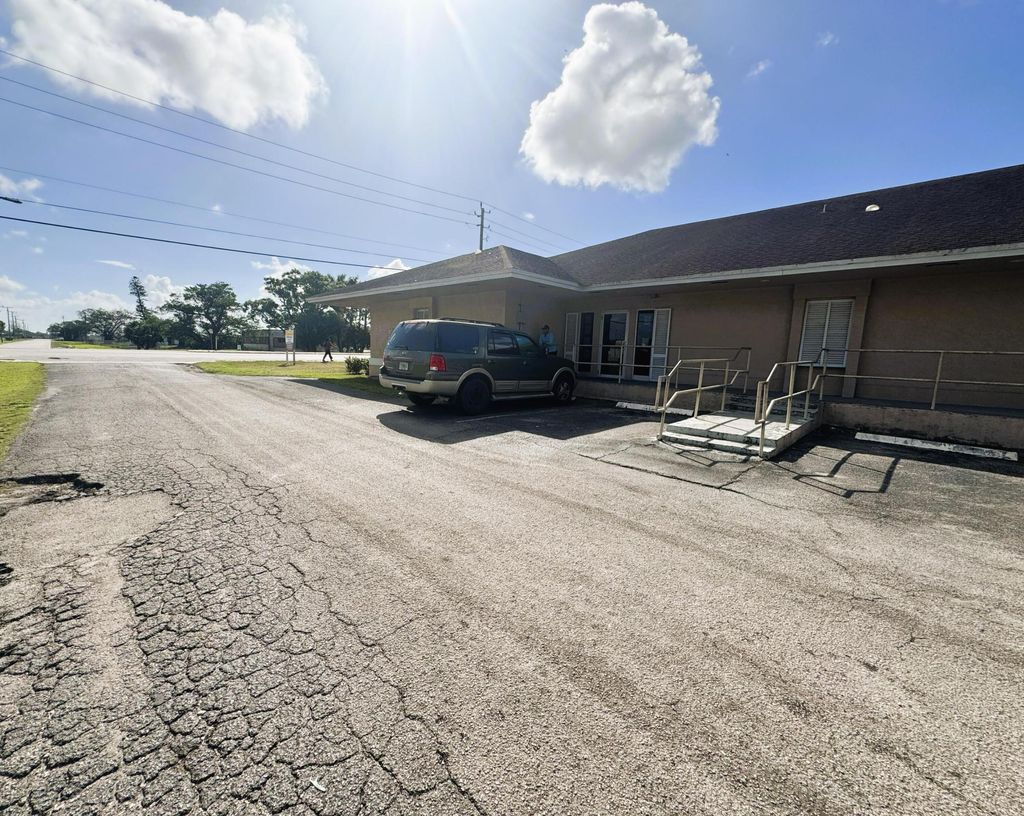 Photo of 1100 S Main Street, Belle Glade, FL (MLS # B26042192)