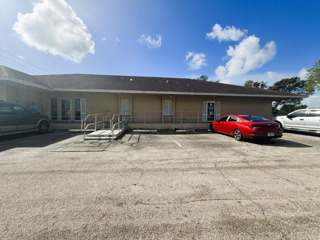 Photo of 1100 S Main Street, Belle Glade, FL (MLS # B26042192)