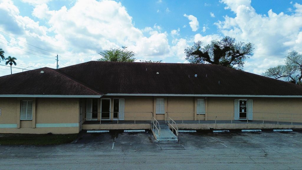 Photo of 1100 S Main Street, Belle Glade, FL (MLS # B26042192)
