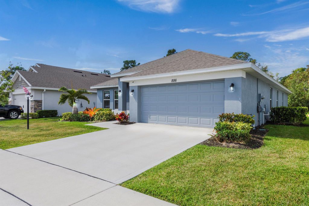Photo of 886 NE Whistling Duck Way, Port Saint Lucie, FL 34983 (MLS # R11003797)