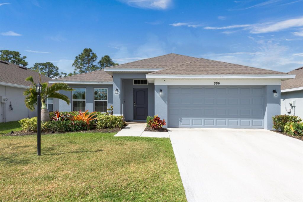 Photo of 886 NE Whistling Duck Way, Port Saint Lucie, FL 34983 (MLS # R11003797)
