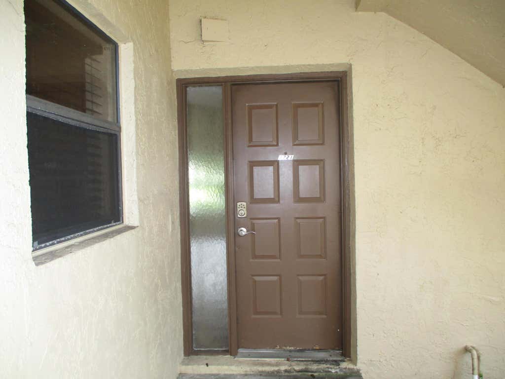 Photo of 3721 Cocoplum Circle, Coconut Creek, FL 33063 (MLS # B26065682)