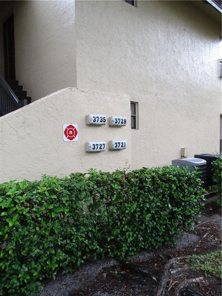Photo of 3721 Cocoplum Circle, Coconut Creek, FL 33063 (MLS # B26065682)