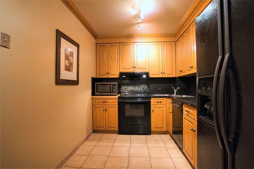 Rarely available first floor unit with garden views. Updated kitchen and bathrooms. Impact windows and storm shutters. Tile floors in living areas and carpet in bedrooms. Split floorplan. Patio area facing south. Great building amenities include heated pool, gym, tennis court, shuffleboard, rec room, library, garage parking and exterior storage. Super SE 17th location is close to beach, airport, downtown, shopping, restaurants, Whole Foods, Quarterdeck and L.A. Fitness. Condo can support 2 cars for 2 driving residents. *NOTE: Must own 2 years before allowed to rent.