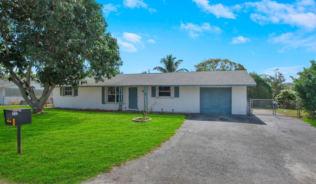 Photo of 712 E Laird Drive, Jupiter, FL 33458 (MLS # R10859624)