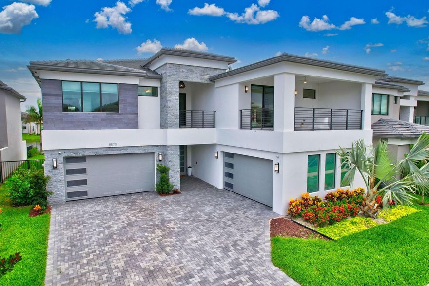Rare opportunity to get into the sold-out model in the Bali collection at Lotus Palm, Boca Raton, one of the hottest new construction community in South Florida. Act fast to own this 5,000+ sq ft home with $500K+ in upgrades. A+ Rated Schools. Features include a cabana bathroom w/shower, pre-wired doors/windows for electric shades & a yard prepped for a pool.Inside, you'll find KETRA lights, SONUS FABER ceiling speakers, BOWER & WILKINS outdoor speakers, 6 WIFI access points, JOSH AI Home Control System, & European hardwood floors. This home also has an IC REALTIME tracking camera, 2 electric smart car chargers, & Lutron landscape lights.Enjoy resort-style amenities: pools, tennis, pickleball, gym, restaurants, bars, poker & game rooms, and Yoga!