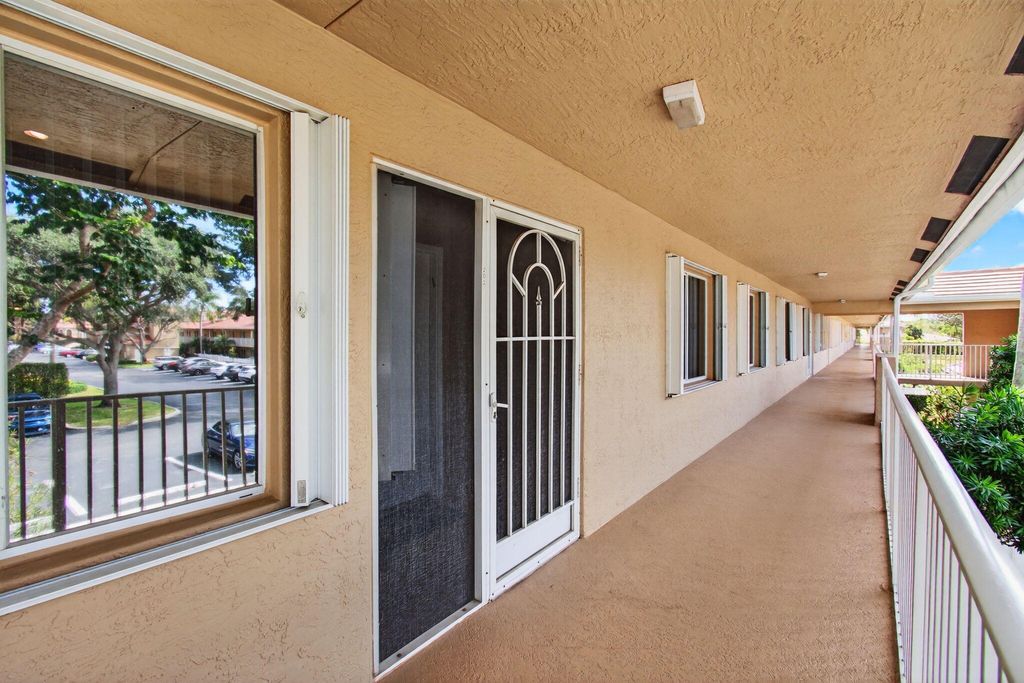 Photo of 5876 Regal Glen Drive #203, Boynton Beach, FL 33437 (MLS # R11160697)