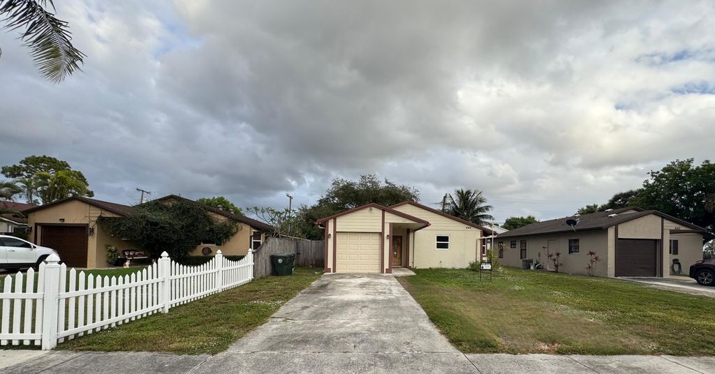 Photo of 444 Broward Avenue, Greenacres, FL 33463 (MLS # R11141948)