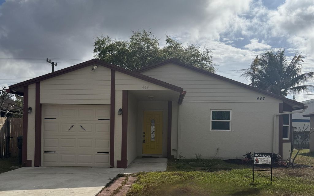 Photo of 444 Broward Avenue, Greenacres, FL 33463 (MLS # R11141948)