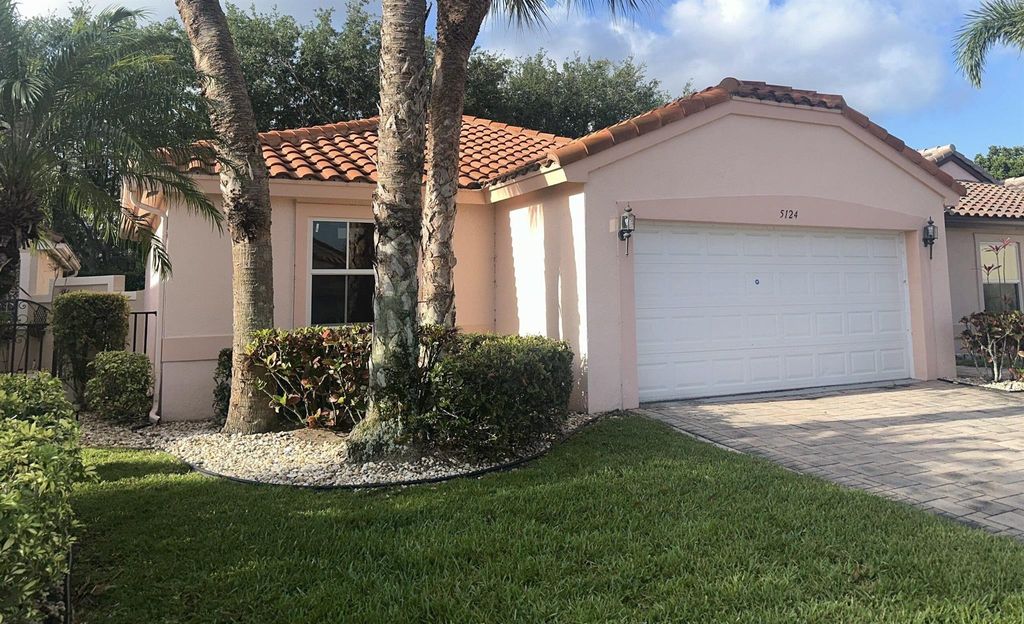 Photo of 5124 Pelican Cove Drive, Boynton Beach, FL 33437 (MLS # R11081686)