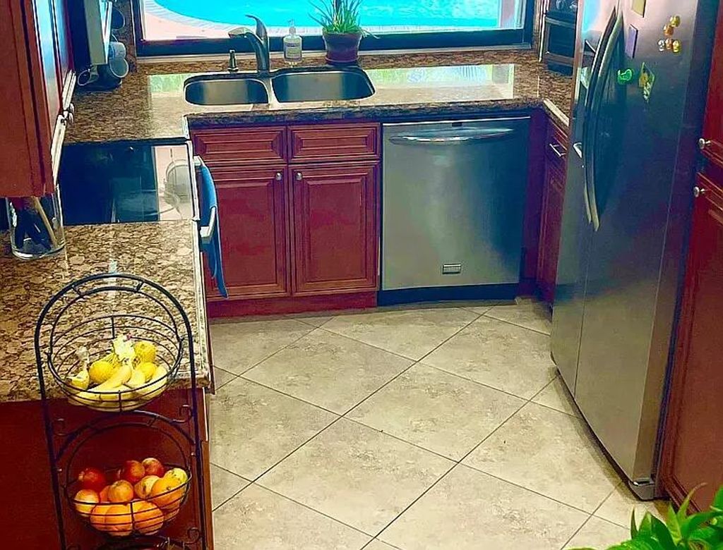 Photo of 7689 W Country Club Boulevard, Boca Raton, FL 33487 (MLS # R11115581)