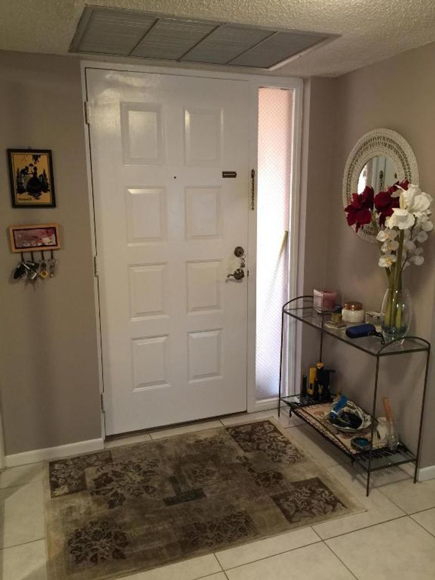 What a find! This hidden charm is located in Boca's popular community, Boca Glades which offers one of the most spectacular lake view and sunset you can imagine! You actually feel like you can touch the water as you relax and enjoy the comfort of this home. This oversized home features a beautifully renovated kitchen with granite, wood cabinets and stainless steel appliances, new vanities and lights in bathrooms, newer a/c, new washer/dryer, hurricane impact sliding glass doors, accordion hurricane shutters, freshly painted, all tile floors through out plus BONUS..extended floor plan adds over 100sq.ft of living space! 2 Pools, club house,fitness center, convenient to Turnpike, Town Center Mall, top rated municipal golf course within lovely community and Parks and Recreation near by,top rated schools WOW!