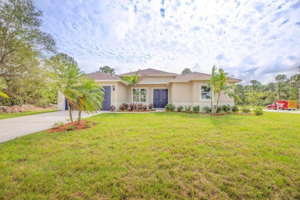 Photo of 3689 SW Savona Boulevard, Port Saint Lucie, FL 34953 (MLS # R10703846)