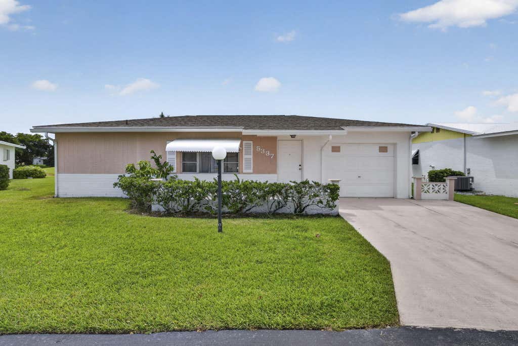Photo of 5337 BELLEVILLE Road, West Palm Beach, FL 33417 (MLS # B26053502)