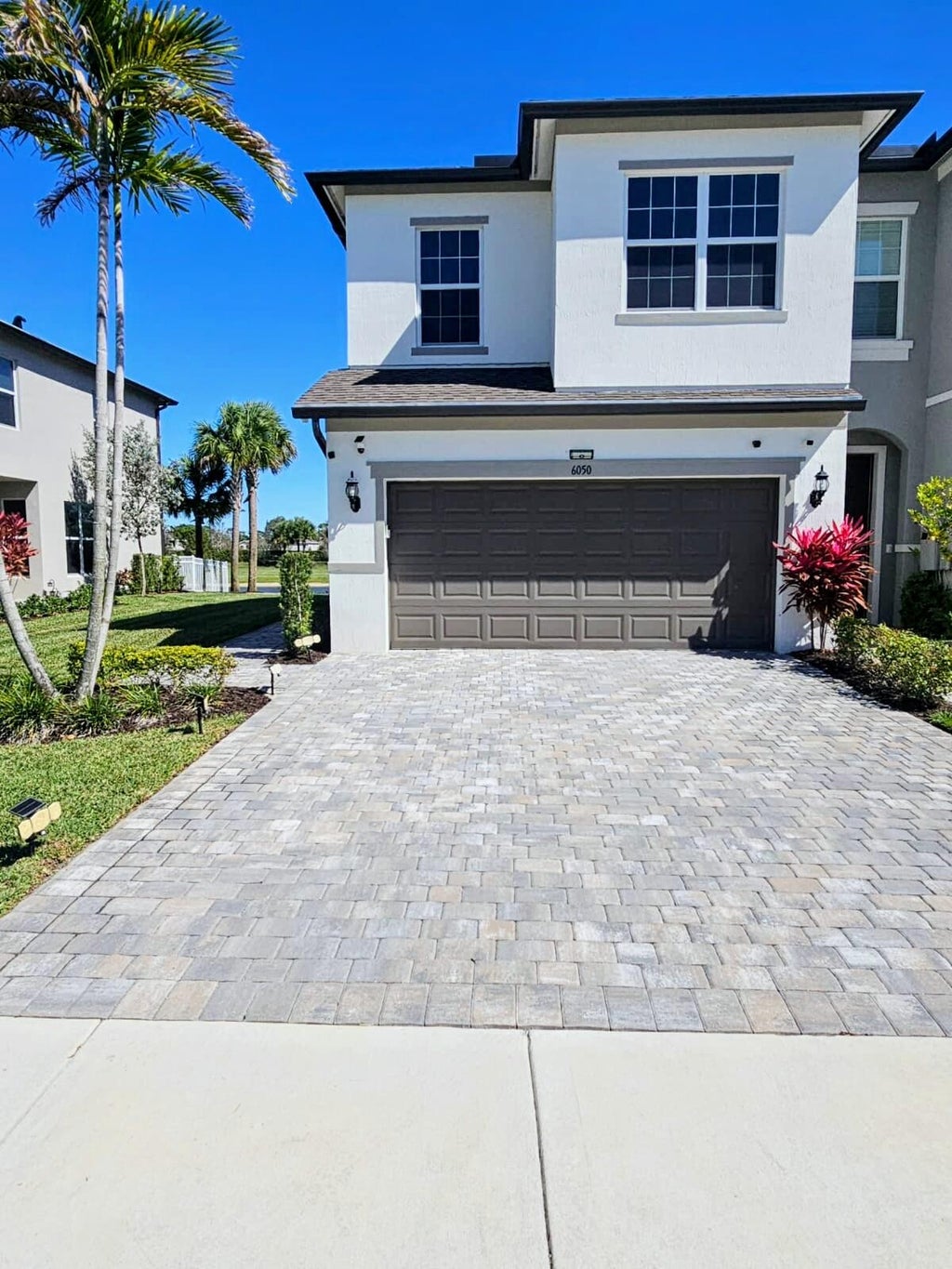Photo of 6050 Praza Lane, Greenacres, FL 33415 (MLS # B26074168)