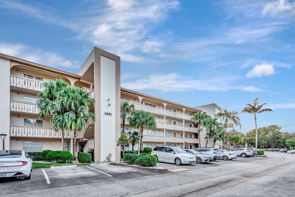 Photo of 2401 Antigua Circle #F1, Coconut Creek, FL 33066 (MLS # B26001905)