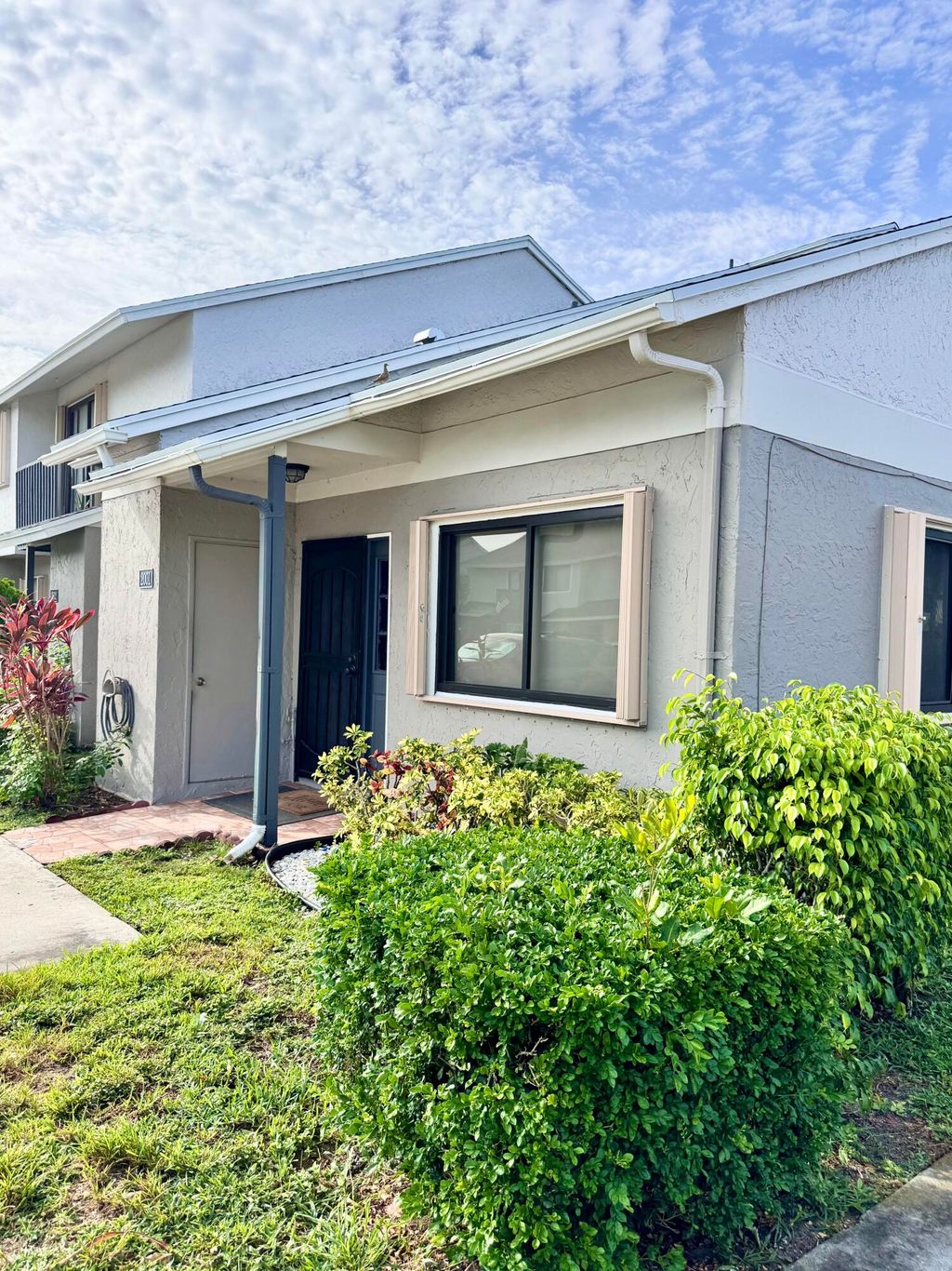 Photo of 2001 Wharf Lane, Greenacres, FL 33463 (MLS # R11104652)