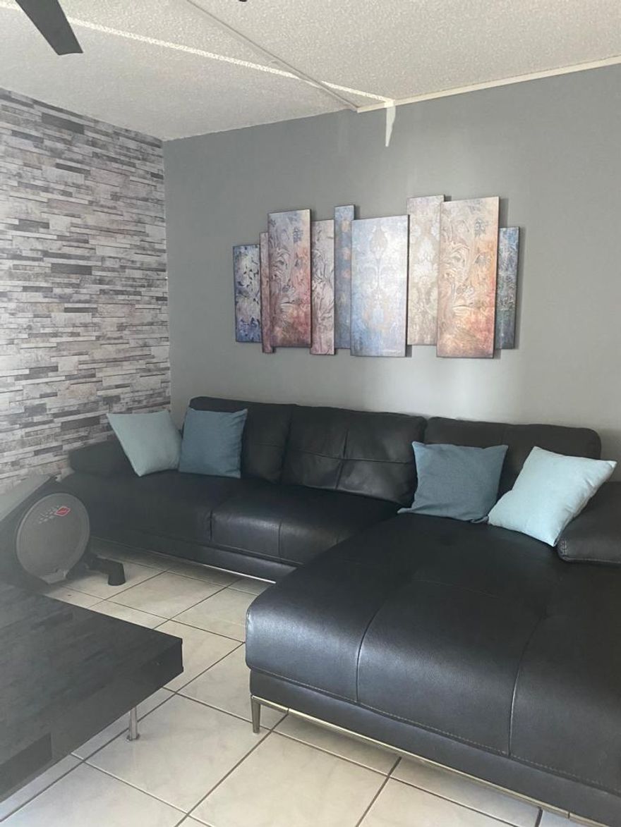 Welcome to your new Florida Home, located only 9 miles to Lauderdale by the Sea's pier and beaches. Lots of stores, restaurants, banks etc. are less than a mile away. This spacious 2 beds & 2 baths condo apartment is the perfect home. Washer and Dryer inside the unit & separate storage area. Remodeled drop ceiling in kitchen, New Refrigerator 2023, Stove 2021, all other appliances working good.  The condo offers Community pool, Tennis court, barbecue grills by the lake, nights security guard & plenty of parking for guess or second cars. Is perfectly locate, minutes from the turnpike,  I-95, & Southwest Expressway. Complex is all ages, & small pets <20lbs are allowed. 40-year repairs and concrete restoration have just been completed with new elevators as of Oct 2023. RENTING is NOT ALLOWED.