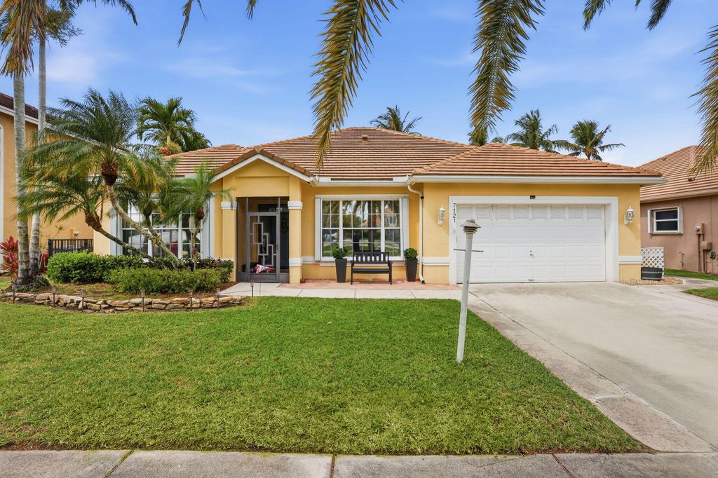 Photo of 7121 Catalina Isle Drive, Lake Worth, FL 33467 (MLS # B26003632)