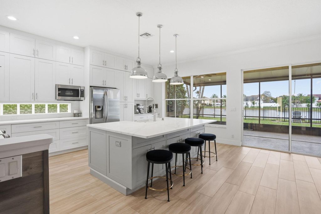 Photo of 7121 Catalina Isle Drive, Lake Worth, FL 33467 (MLS # B26003632)