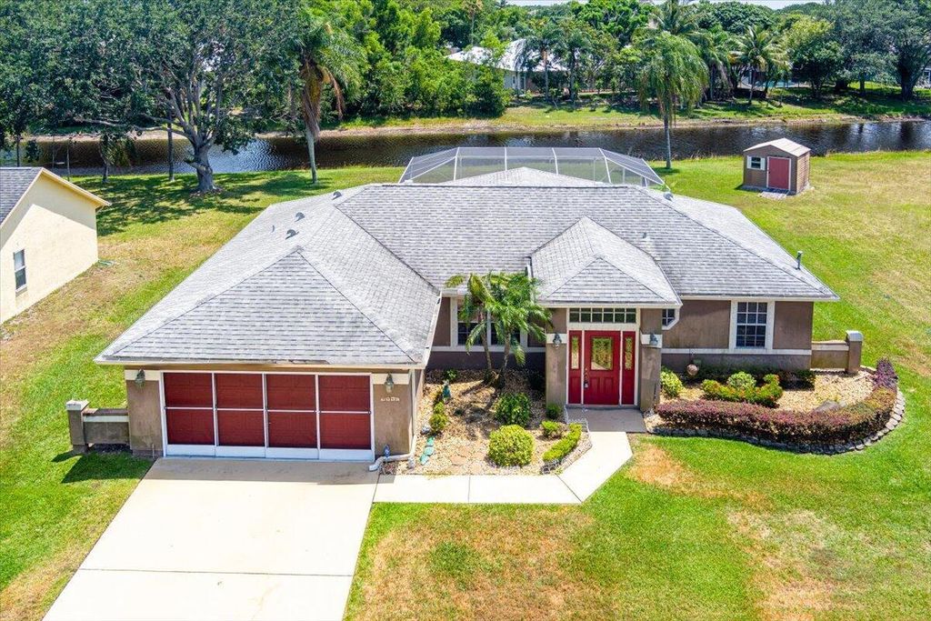 Photo of 1824 SE Gaskins Circle, Port Saint Lucie, FL 34952 (MLS # R11089576)