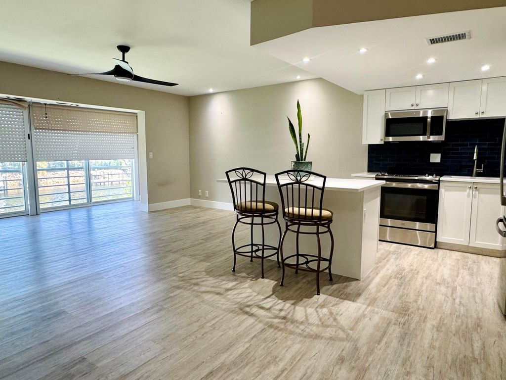 Photo of 342 Southwind Drive #211, North Palm Beach, FL 33408 (MLS # R11119310)