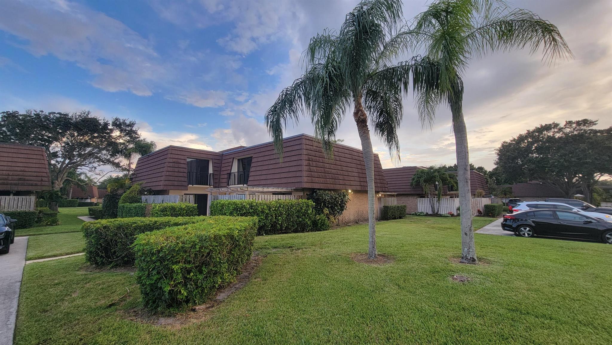Beautiful and spacious townhome. The main level den is large enough to be a 3rd bedroom. Two and a half bathrooms. This unit has 2 balconies. One off of each bedroom. The master looks like it is right out of a vacation magazine. including a seamless shower. Tile on the 1st floor and brand new luxury vinyl plank flooring on the 2nd floor. ABSOLUTELY NO CARPET! The kitchen is certainly the heart of the home, with top of the line cabinets and granite countertops and beautiful tile backsplash. Enjoy the pergola outside on the patio with string lighting. This is a must see. Very close to shopping restaurants and entertainment. 15 minutes from West Palm Beach International.