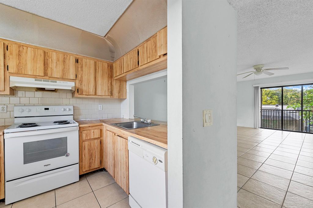 Photo of 9141 NW 1st Court #204, Pembroke Pines, FL 33024 (MLS # R11148962)