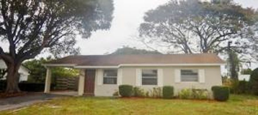 Fantastic turn key home is situated on a large lot with lovely Oaks in the heart of Jupiter. The residence has been freshly painted inside & out and  new carpet and tile installed. The kitchen has all new appliances & countertops, tile backsplash, ample cabinetry and opens onto a dining area/living room. There is a spacious family room, laundry room, storage closet and 1 car carport.  Conveniently located between I-95 & A1A in area of A+ rated schools! All Information recorded in the MLS is intended to be accurate but cannot be guaranteed, buyer advised to verify. Sold As-Is.