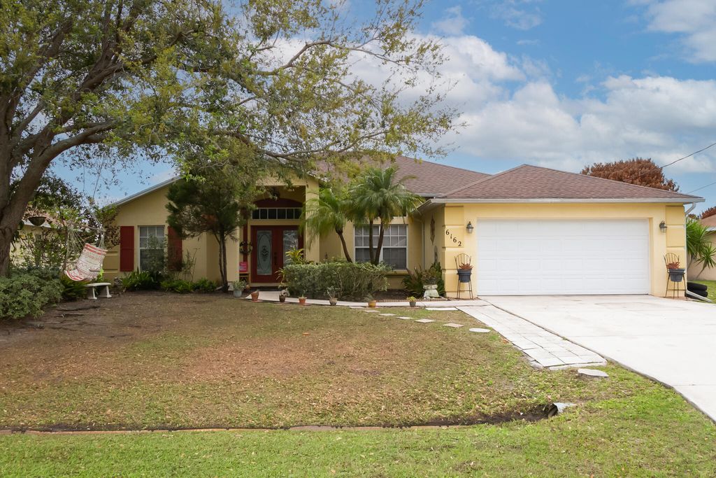 Photo of 6162 NW Gatun Drive, Port Saint Lucie, FL 34986 (MLS # B26004053)