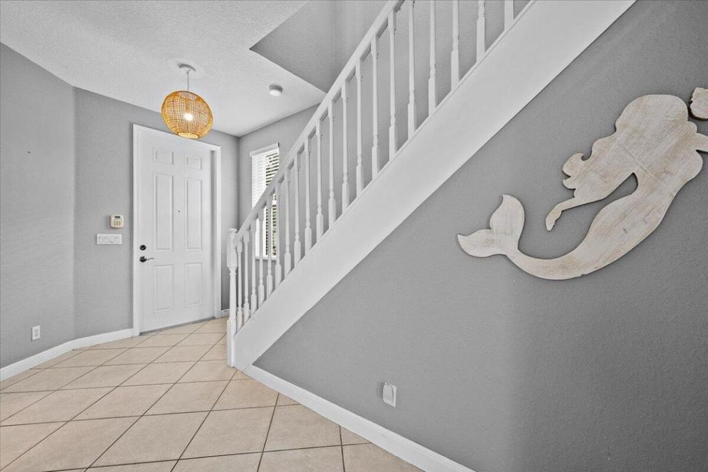 Photo of 647 Castle Drive, Palm Beach Gardens, FL 33410 (MLS # R11149193)