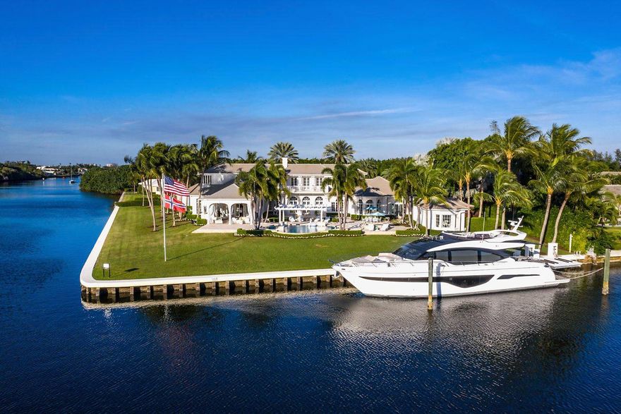 One of Gulf Stream's most desirable addresses, commanding a southern point lot view from nearly every room this Hamptonesque waterfront estate, designed by Randall Stofft, is situated on a rare one acre plus lot, encompassing over 470' of frontage and embracing the tenants of coastal living at its best.  With a warm feeling of belonging and a gracious layout with panoramic water views the estate is comfortably spacious with 6 en suite bedrooms, 7 full baths, first floor master, epicurean kitchen with informal dining surrounded by water, sun filled family room, State of the Art Home theatre, formal dining room, dual offices, exercise room, massage room, loft area, guest house, five star resort pool, entertaining loggia with outdoor kitchen, 3 bay garage and a yachtsman's dock, all seamlessl integrated into 12,567 total square feet.  This Jewel in the Crown estate is just moments from the pristine sandy beaches, upscale shopping and restaurants, and many exciting diversions. Close to international airports for easy access. Your favorite part of going out will be coming home to your sumptuous estate. Don't miss this rare opportunity!