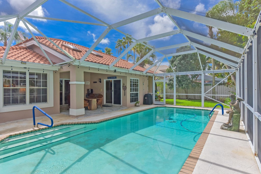 Photo of 348 Eagleton Golf Drive, Palm Beach Gardens, FL 33418 (MLS # B26061782)