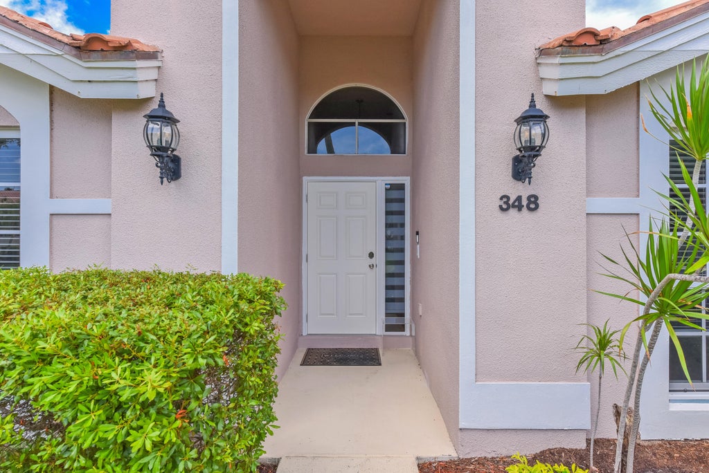 Photo of 348 Eagleton Golf Drive, Palm Beach Gardens, FL 33418 (MLS # B26061782)