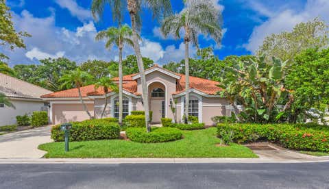 Photo of 348 Eagleton Golf Drive, Palm Beach Gardens, FL 33418 (MLS # B26061782)